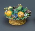 Ceramic basket of fruit and flowers
