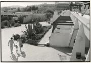 Family walking in nudist village, Cote d'Azur, France