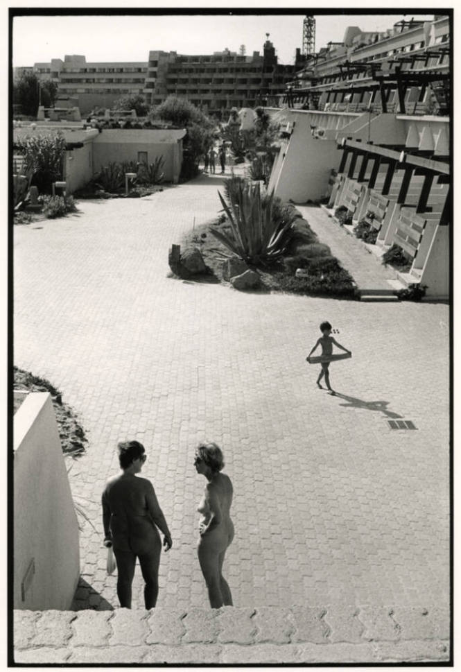 Women talking in nudist village, Cote d'Azur, France
