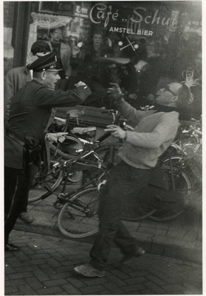Policeman hits a protestor, Amsterdam, Holland