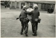 Battered and bleeding youth carried off by the police, Londonderry, Northern Ireland