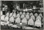 Chairs in front of cafe, Paris, France