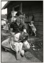 Girl crying with her mother (Poor white people), Kentucky, USA