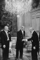 Eisenhower, De Gaulle, and Robert Schumans at a formal reception, Paris