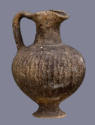 Artist Unknown, Cypriot, Oinochoe, 1050-750 B.C.E., Earthenware, black slip, 6 1/4 x 4 1/2 x 4 …